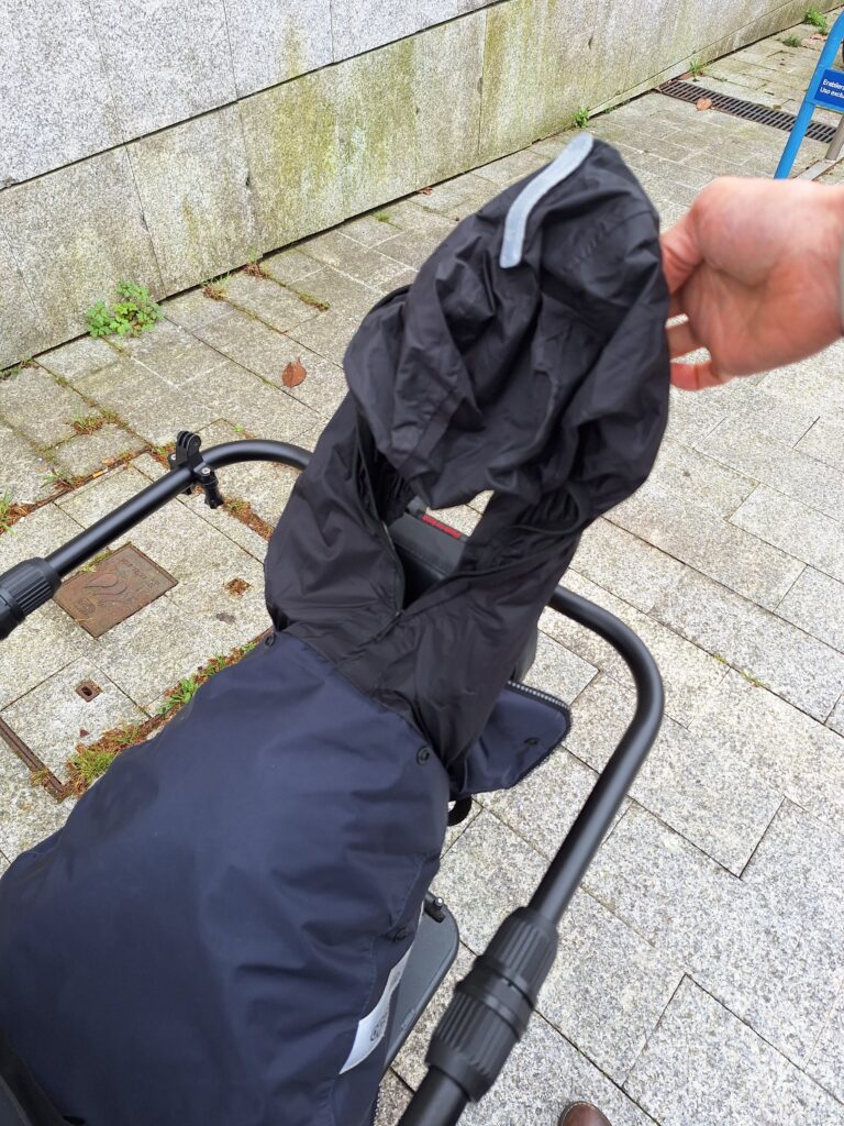 Manta Tucano Urbano con capucha para proteger a los niños de la lluvia en bici